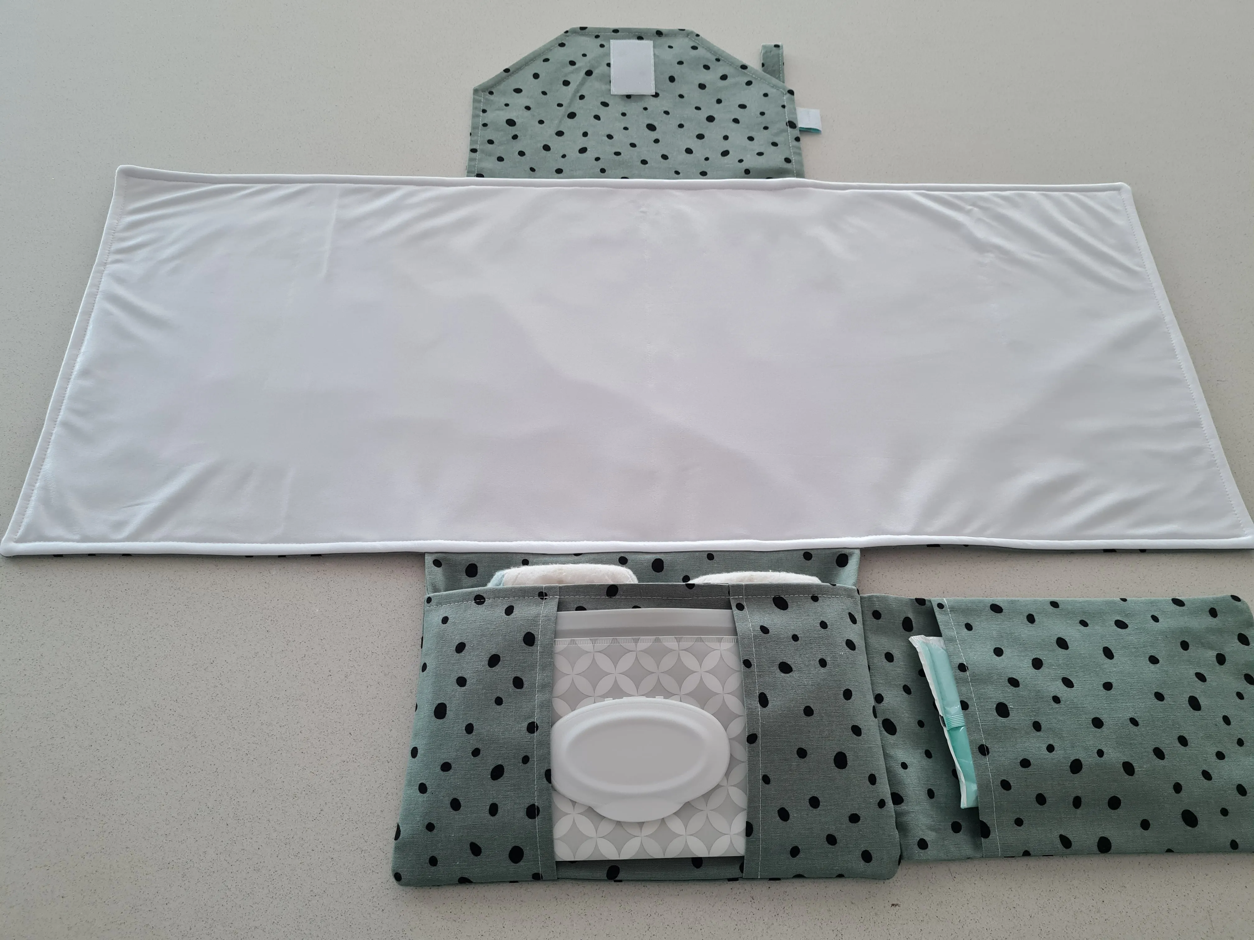 Dots on Green Nappy change mat clutch (Pre Order - Dispatches 10 - 12 days)