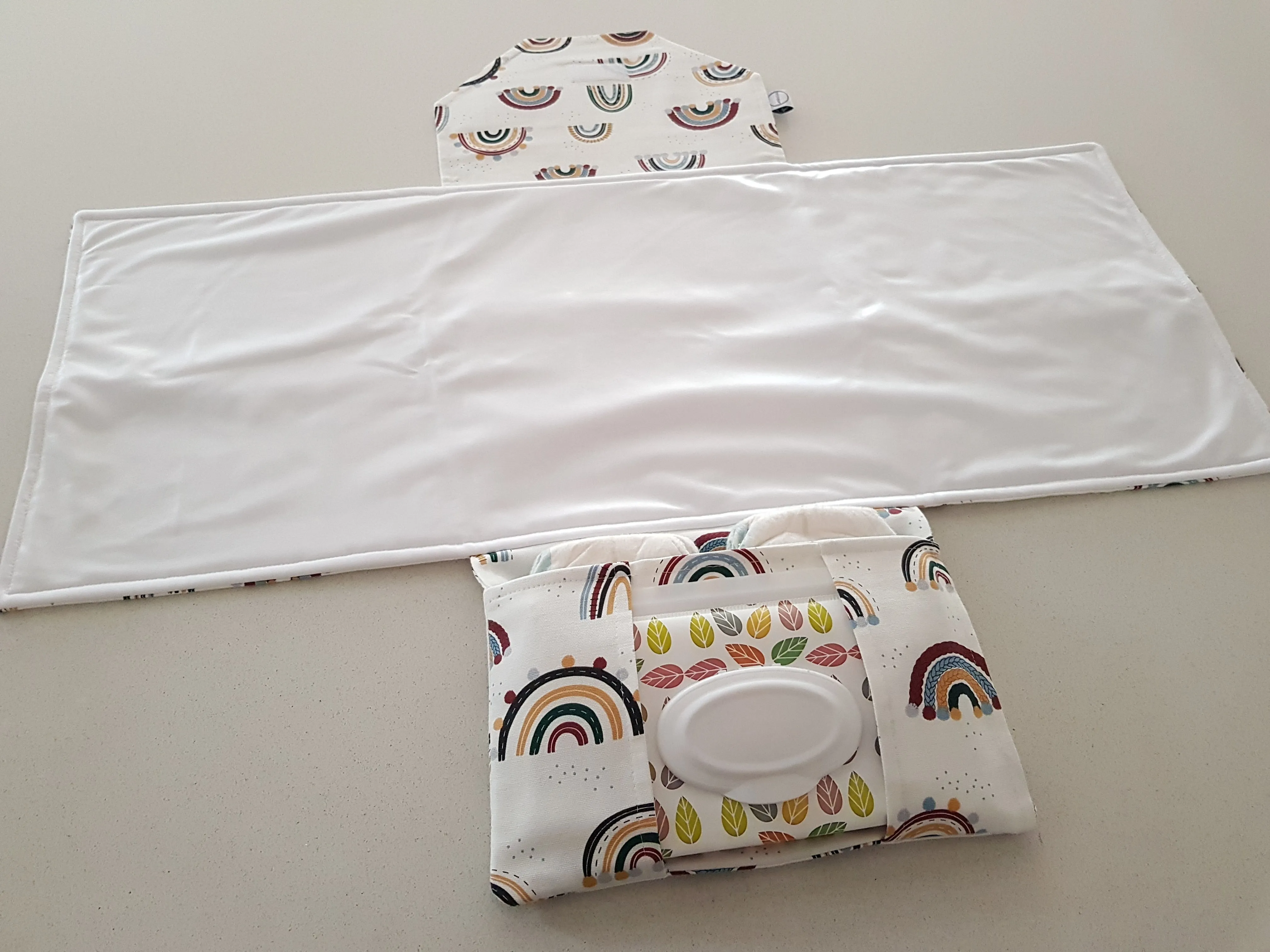 Rainbows & pom poms Nappy change mat clutch (Pre order - Dispatches in 10 - 12 days)