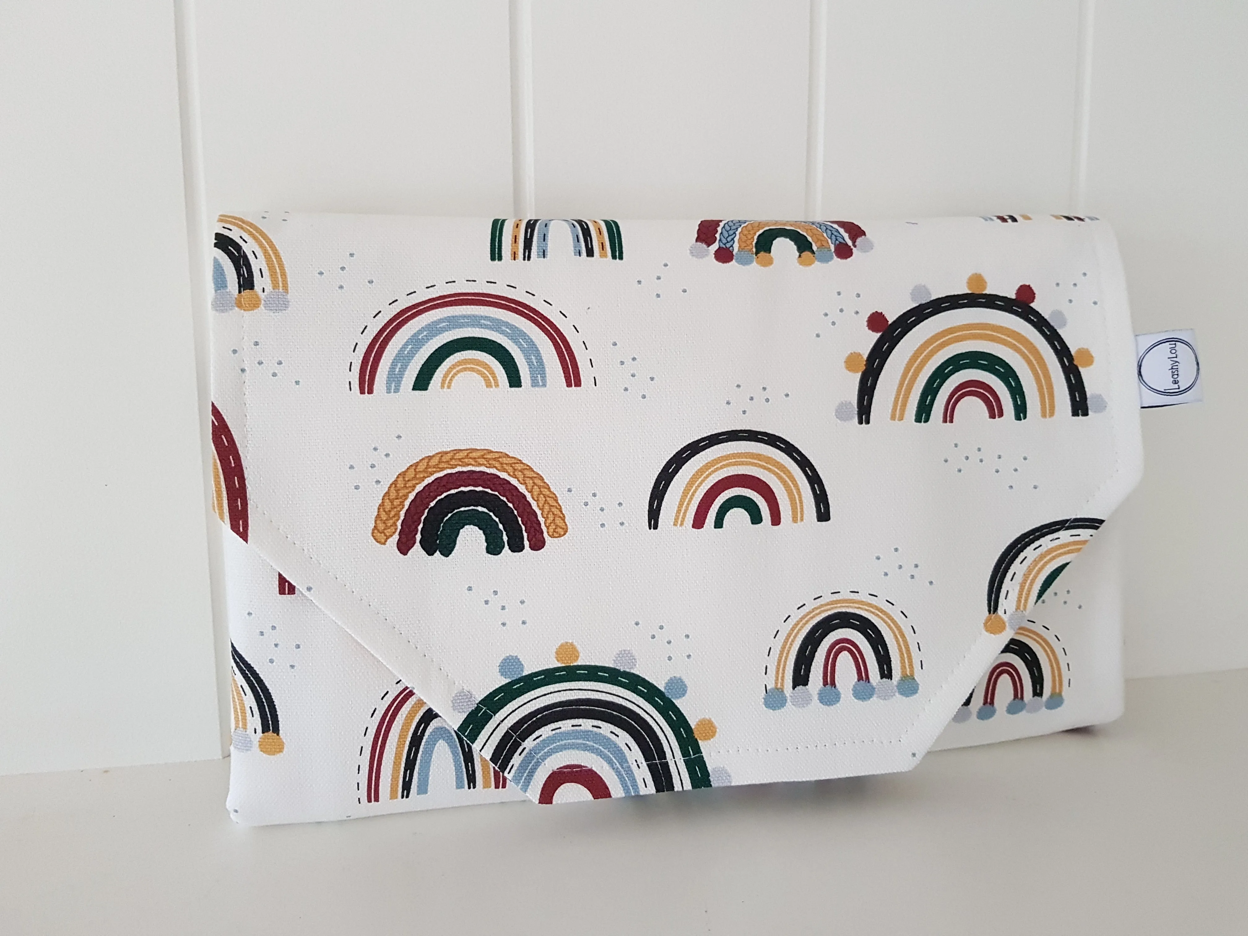 Rainbows & pom poms Nappy change mat clutch (Pre order - Dispatches in 10 - 12 days)