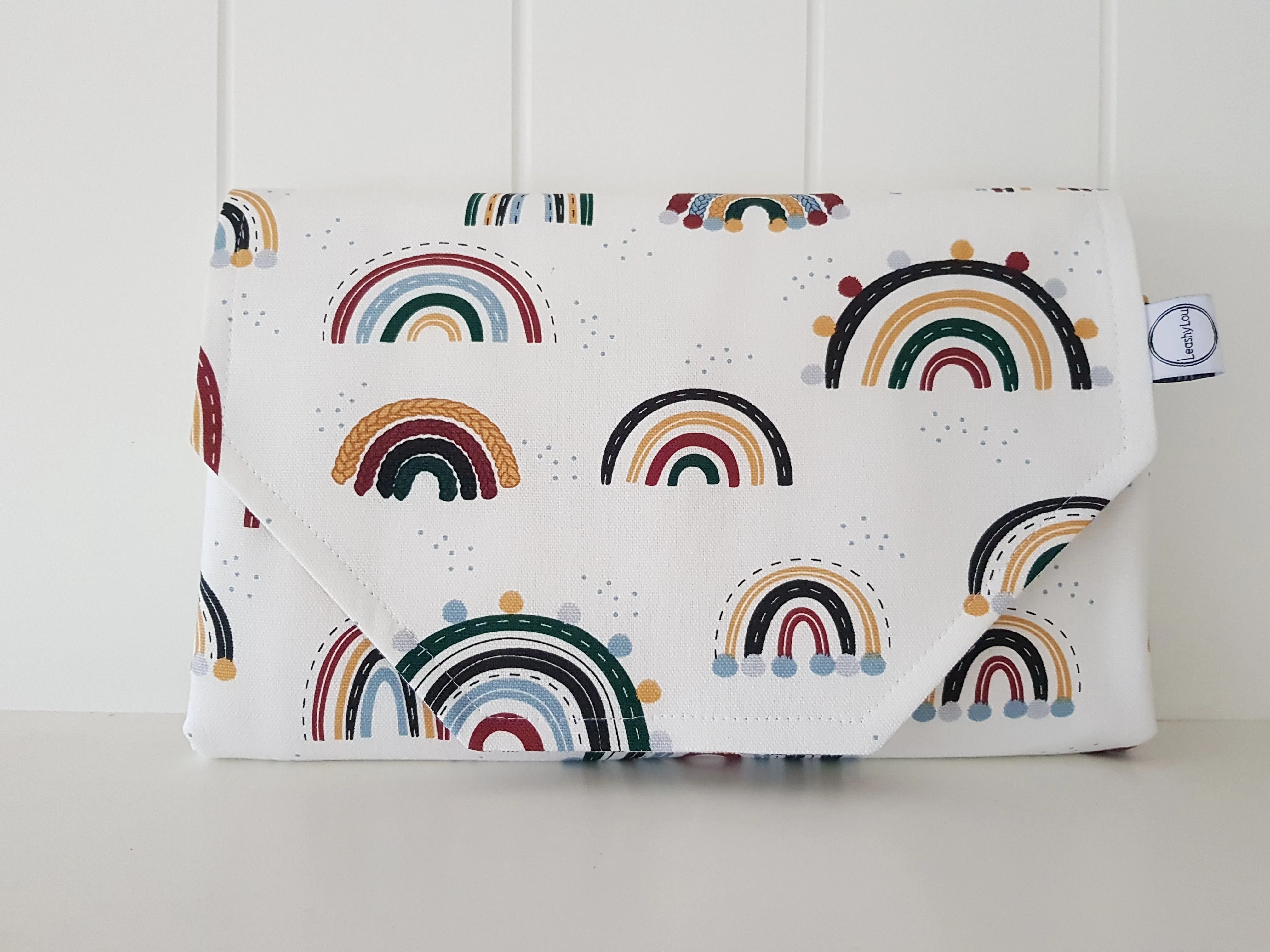 Rainbows & pom poms Nappy change mat clutch (Pre order - Dispatches in 10 - 12 days)